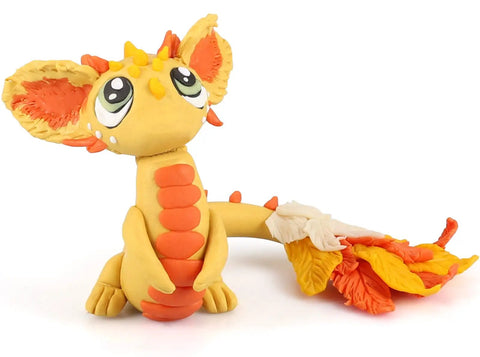 Colorful clay creature made with Ultimate Polymer Clay Starter Kit With 50 Vibrant Colors, Oven Bake Modeling Clay, 2.8 Lb Total.