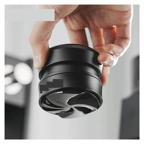Hella Smooth Espresso Bed Leveler Cyclone Coffee Distributor Spinner For 51 58 Mm Portafilters held in a hand, modern design, high heat proof material.
