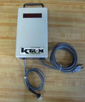 Heavy Hitter DMT Digital Readout Tester Featuring Knockout Five Digit Screen with plug play cables on a wooden surface.