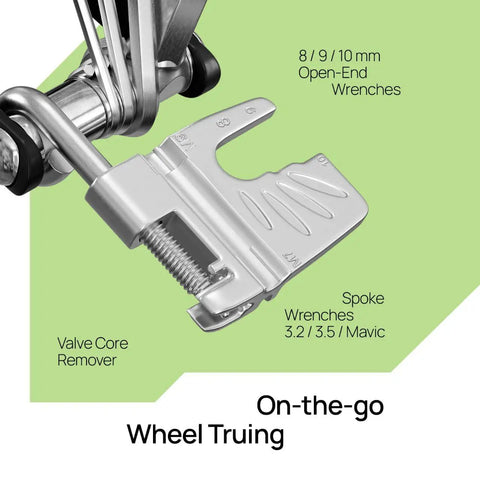 Close-up of All In One 20 In 1 Bike Repair Kit with valve core remover and spoke wrenches, perfect for wheel truing.