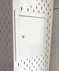 Heavy Duty Paintable Metal Access Door For Wall Or Ceiling No Sweat Setup Hatch For Plumbing Cable And Electrical Checks Reliable Plug And Play 14X18 Panel installed in a wall with a locking mechanism.