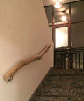 Rock Solid Adjustable Rustic Wood Handrail With No Sweat Mount Bracket And Anti Skid Surface Lifetime Indoor Wall Grip For Stairs Hallway Senior Safety No Fuss Villa Loft Corridor Ramp Support Bar mounted on wall next to stairs.