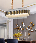 Sleek Black And Gold Stainless Steel Ceiling Pendant Light Bringing That Clean Modern Glow To Your Space Dimmable Hanging Lamp With Glossy Glass Led Shade in dining room.