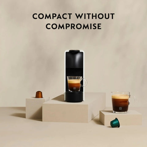 Tiny But Mighty Espresso Machine For Home Use With 25 Second Heat Up And Auto Shut Off, Barista Grade Single Serve Espresso In A Sleek Mini Unit, Capsule Pod Compatible, Energy Saver, Piano Black Finish displayed with espresso cup.