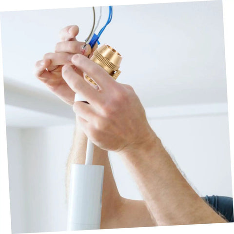 Hands installing Solid Brass Cord Grip For Edison Style Pendant Lights, Threaded Cable Locker Strain Relief in action