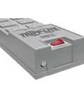 Six Outlet Surge Protector Power Strip With Six Foot Cord And Right Angle Plug For Home Office And Electronics Protection From Surges And Spikes Plus Insurance Up To Fifty Thousand Dollars In Grey, close-up of outlets and switch