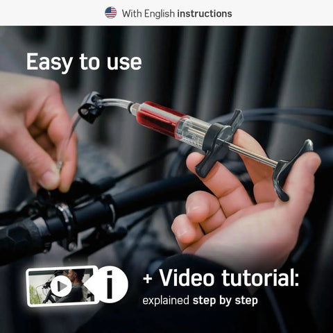 Person using Pro Grade Brake Bleed Kit For Shimano Tektro And TRP Hydraulic Disc Brakes With Video Guide Includes 2x Mineral Oil