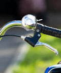 Loud As Heck Clear Safety Bell For Electric Scooters And City Commuter Bikes Fits 0.86 To 1.18 Inch Handlebars Easy Thumb Trigger Install Audible Ring That Cuts Through Traffic Ideal For Bikes Cruisers And Trikes on chrome handlebar
