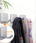 Heavy Duty Adhesive Towel Hooks 4 Pack Stainless Steel Self Adhesive Wall Hangers in use with towels hanging, brushed finish