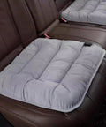 Cozy Brown Heated Seat Pad With Soft Plush Cushion For Office Chair At Home Or Work featuring adjustable heat settings.