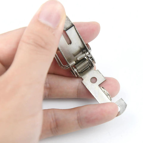 Close-up of a 4 Pack Beefy, Heavy Duty Spring Loaded Toggle Latch Catch in 304 Stainless Steel, showing spring mechanism and clasp.