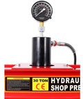 Professional Grade 30 Ton Air Hydraulic Shop Press With Precision Gauge And Adjustable H Frame Design For Garage Floor Ready Builds And No Sweat Bearing Bushing Ball Joint Removal Jobs close-up of pressure gauge and hydraulic cylinder