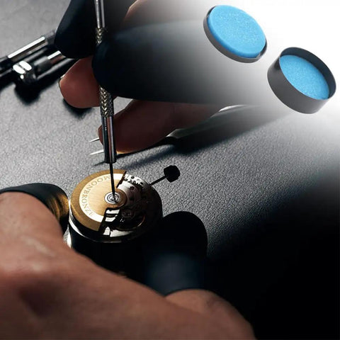Applying Two Pack Watch Gasket Grease Silicone Sealant on watch mechanism, shown with two blue silicone grease containers.