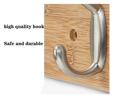 Close-up of a heavy duty hook from the Slick Wall Mount Coat Rack With Heavy Duty Hook Rails For Entryway And Mudroom Hang Your Duds Gear And Bags Without A Hitch Rustic Wood And Zinc Alloy Storage Solution.