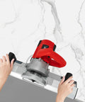 Heavy Duty 43 Degree Electric Tile Chamfering Tool 1200W Pro Grade Bevel Cutter with stable base held by hands above ceramic tile.