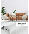 Hassle Free Peel And Stick Self Adhesive Wallpaper Roll Hella Waterproof Moisture Proof Thermal Insulation Wall Sticker Pasteless Contact Paper Super Snazzy Home Decor Big Time Upgrade 50X300Cm Wrap on white backdrop with brown couch and indoor plants.