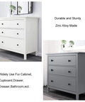 Sleek Matte Black Cabinet Knobs Pack Of 25 on white and gray dressers in a modern setting, Zinc Alloy Hardware visible.
