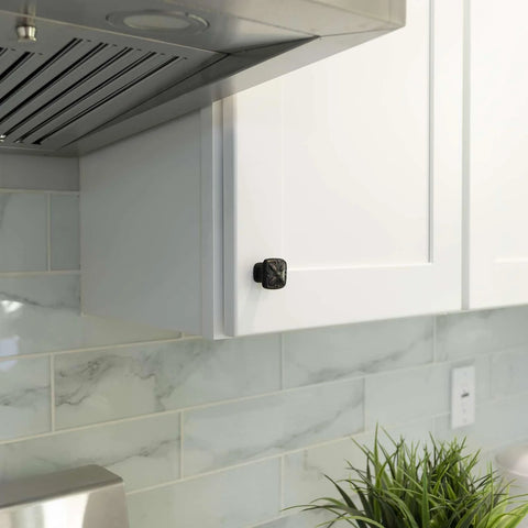 Solid Zinc Alloy Cabinet Pull Knob One And One Eighth Inch Oil Rubbed Bronze installed on kitchen cabinet