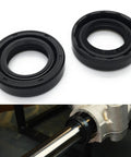 Axle Oil Seal Replacement Kit Two Piece Set 0.750 In By 1.250 In By 0.312 In Premium Materials Built Tough Seals Fits A Wide Range Of Vehicles And Brands Today., two black axle oil seals shown with shaft installation