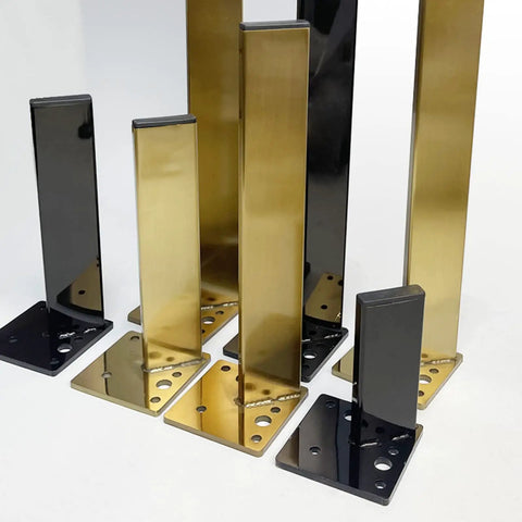 Tough As Nails 4 Pack Stainless Steel Furniture Legs Rock Solid Table Risers For TV Stand Ottoman Cabinet DIY Replacement Metal Feet With Rubber Pads 60 Cm 23.6 Inch in black and gold finish.
