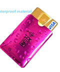 16 Piece RFID Blocking Sleeve Set With 12 Colorful Credit Card Protectors And 4 Passport Holders, Waterproof Aluminum Foil Wallet Shield To Stop Skimming And Electronic Theft On The Go, shown with purple sleeve