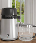 Top Shelf Countertop Water Distiller Full One Gallon Capacity Solid Stainless Steel Build With Glass Pitcher Straight Up Pure Desktop Unit.