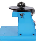 Heavy Duty Rotary Welding Positioner With Sturdy Three Jaw Chuck And Smooth Zero To Ninety Degree Tilt For No Sweat Seam Welding Runs side view showing blue structure and rotating plate.