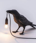 Raven Bird Resin Wall Lamp And Desk Light With LED Bulbs, black crow design holding LED bulb, resin material, unique lighting.