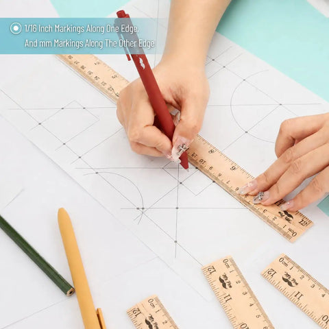 Person using Wooden Rulers Bulk Pack 12 Inch Measuring Rulers With Inches And Centimeters on a drawing project.