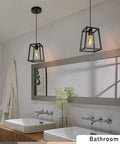 Bathroom view with Sleek Black Modern Kitchen Island Lighting With Open Geometric Frame 4 Light Farmhouse Chandelier visible above sinks.