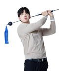 Person using Fast Swing Golf Trainer For Speed And Path Improvement Distance Boost With Lightweight Stick And Latex Band indoors