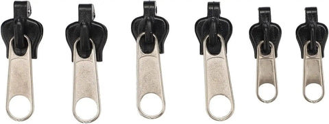 Six Piece Universal Zipper Repair Kit For Quick Fixes On Clothes Bags And Gear Includes Sliders Top And Bottom Stops Zipper Teeth Design Easy DIY Repair Kit For Fast Zipper Fixes Durable All In One with six metal and plastic zipper sliders displayed in a row.