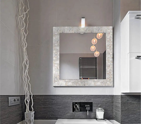 Peel And Stick Backsplash With Natural Mother Of Pearl Mosaic Shell Tiles, seen on mirror frame in modern bathroom decor.