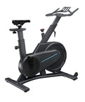 Quiet Indoor Cycling Bike With LCD Monitor And Heart Rate Tracking featuring adjustable resistance, side view in home setting.