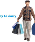 Elderly man carrying shopping bags with Portable Electric Seat Lift Assist, promoting easy use and mobility support.