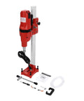Workhorse Diamond Core Drill Machine With Heavy Stand, 4250W 500RPM Copper Motor Built For Wet Concrete And Masonry Coring, Dead Simple Depth Control And Safety Clutch, 10 Inch Bit viewed from the side with accessories.