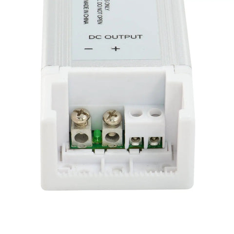 Close-up of 24V LED Strip Light Power Supply And Triac Dimmable Driver 120W Converts 120V AC to 24V DC output terminals