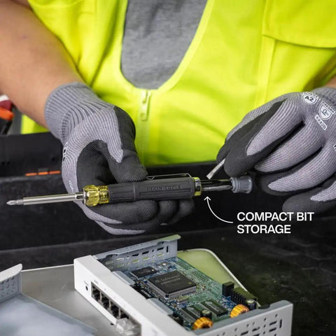 Person using Mini Precision Screwdriver With Pocket Clip And Magnetic Driver 13 In 1 All Purpose Bit Set for electronic repair.