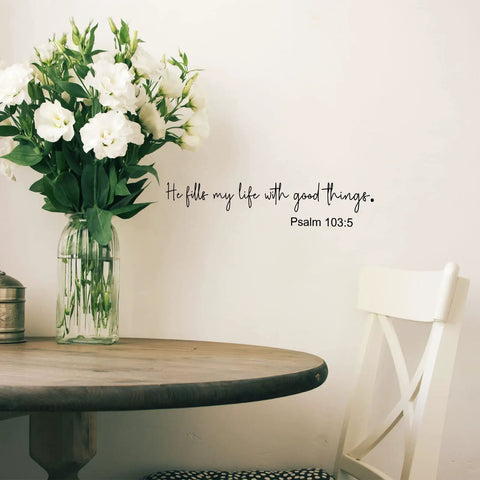 Bible Verse Wall Decals Set With Inspirational Quotes Peel And Stick Religious Scripture Stickers For Bedroom Living Room Office And Bathroom Decor To Lift Your Vibe And Feed Your Faith on wall beside flowers on table.