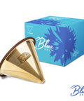 Titanium Coated Stainless Steel Pour Over Coffee Filter With Double Layer Mesh Cone For One To Four Cups Reusable Paperless Filter Easy Clean Barista Quality Brew At Home Or On The Go next to blue box display