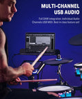 Musician playing Electric Drum Set With Lights And 7 Inch Touchscreen 1126 Sounds Customizable Pad Colors Internal Rack Wiring BackBeat Gaming App Advanced Electronic Drum Kit For Practice And Live Jams with multi-channel USB audio integration