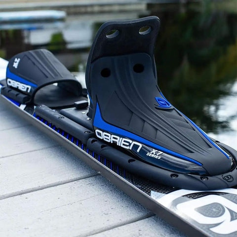 Close-up of Adult Water Skis Celebrity Ski Combo For Beginners To Pros 68 Inch Blue with X-7 bindings on dock