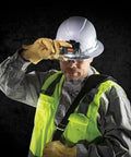 Worker wearing hard hat with Intrinsically Safe LED IP67 Headlamp for Hazardous Areas Attaches to Hard Hats and Safety Helmets
