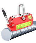 Rock Solid Heavy Duty Magnetic Lifter With Release Handle For Flat Plate Steel And Round Bar Works Like A Dream At Six Thousand Six Hundred Pounds No Sweat, red magnetic lifter on a cylindrical steel bar.
