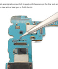 Applying Professional Solder Paste For Electronics Pros And Diyers 183C Melting Point High Viscosity on PCB with tweezers