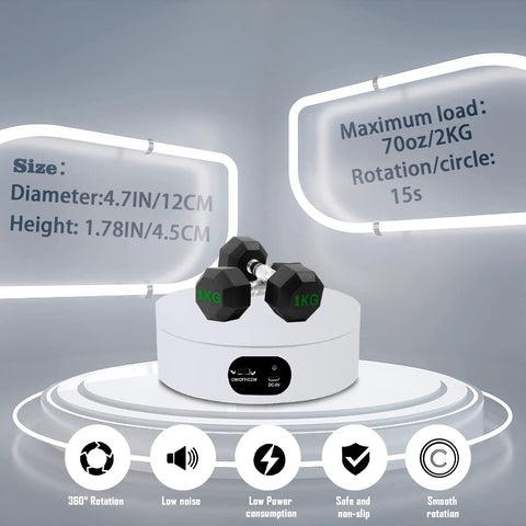 Badass Electric Powered 360 Motorized Tumbler Display Stand with dumbbells on a white base, featuring 360 rotation and smooth operation.