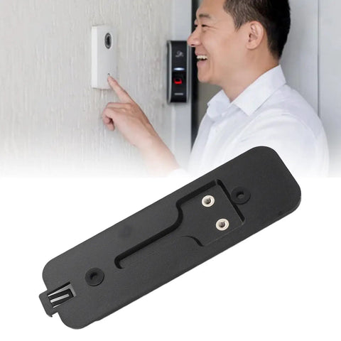 Sturdy Black Back Plate Mount Accessory For Video Doorbell Quick Install And Easy Repair, shown in a front view with a person touching a doorbell