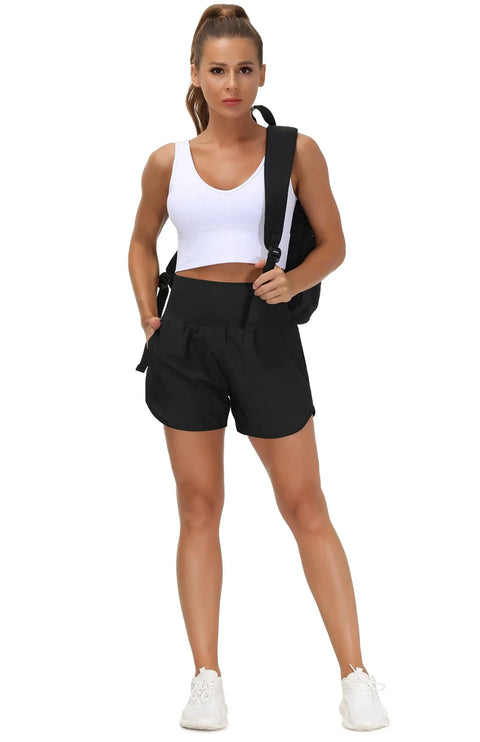 Woman wearing Women's High Waist Running Shorts With Liner For Athletic Training And Hiking Zip Pockets And Back Pocket Secure No Roll Waistband
