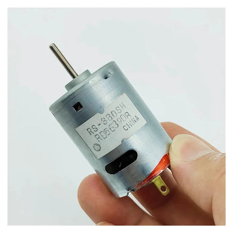 Beefy Little 380 DC Motor For DIY Projects 6V To 18V 12V 11000 RPM With 27.5mm Carbon Brush Impeller Design held in hand