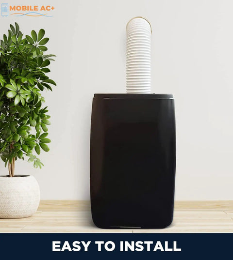 Portable air conditioner with exhaust hose showing easy install feature, alongside plant, in indoor setting.